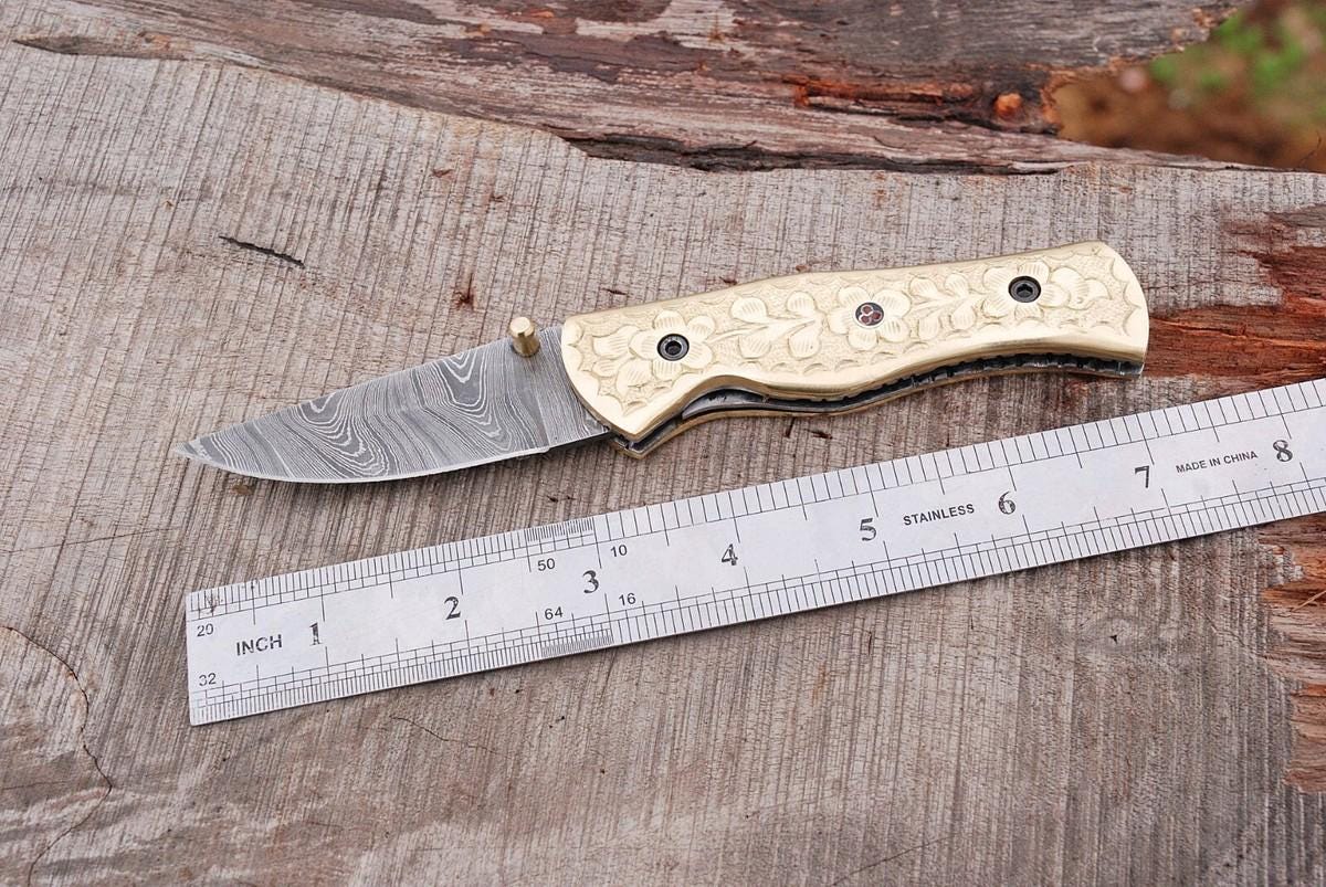 Hand forged damascus steel foldinh Pocket knife W/BRASS Engraved handle